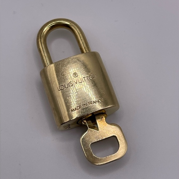 100% Authentic and pre loved Louis Vuitton - Gold Lock and Key set #300 - Picture 2 of 5